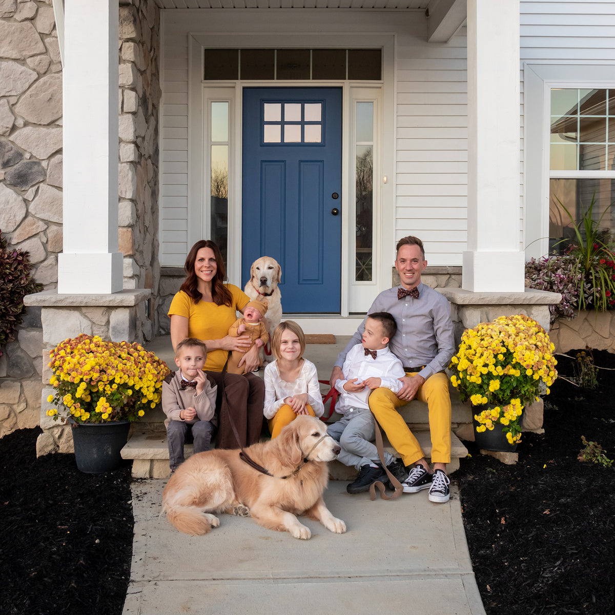 Family photo with brown and white polka bow ties