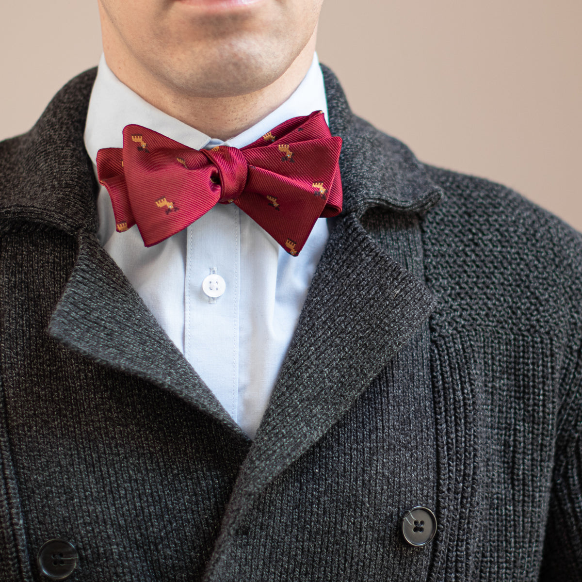 Maroon reindeer Christmas bow tie with gray sweater