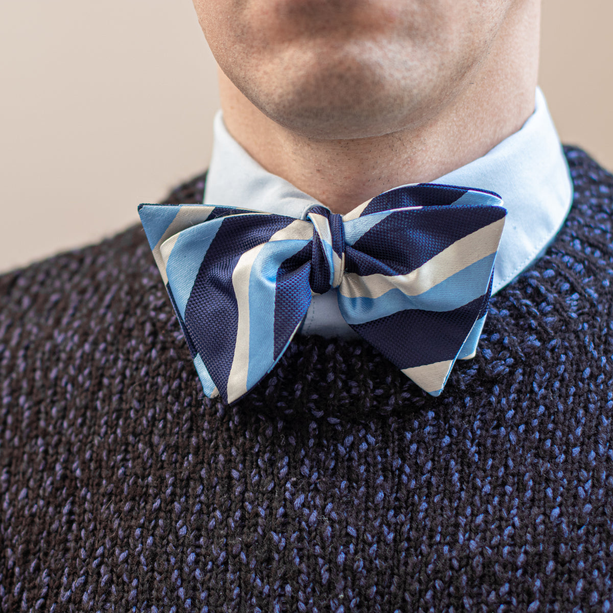 Blue &amp; silver striped bow tie with knit sweater